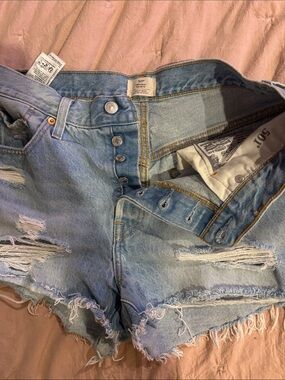 Levi's Light Blue Distressed Denim Shorts